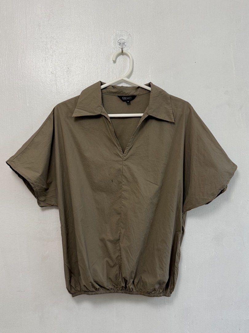 MEMO Olive Green Collared Short Sleeve Top (Category: Shirts) located in Mandaluyong City. Submitted by nftp24 (Listing ID 1464167967, Image 1). Description: - Olive green top from MEMO - Short sleeves - Collared neckline - Elasticated hem - Minor marks on the front (please check photos) .