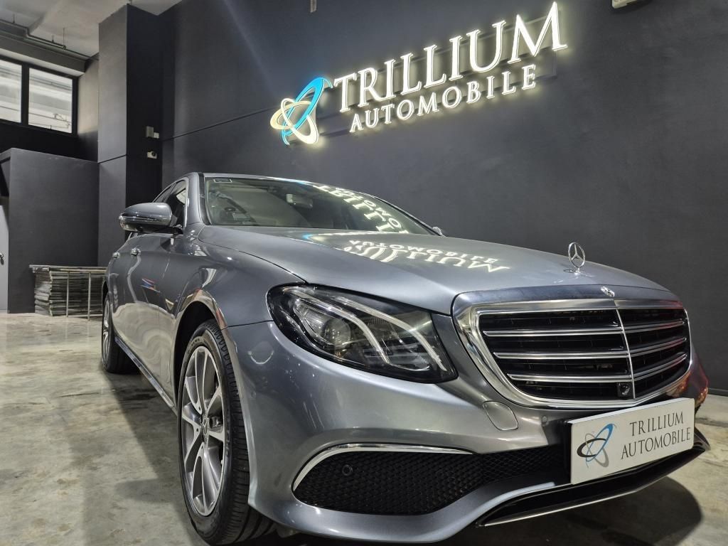 Mercedes-Benz E-Class Saloon E200 Exclusive (A) (Category: Used Cars) located in Singapore. Submitted by trillium.auto (Listing ID 1464281379, Image 1). Description: 🚘 Vehicle Features 2l turbocharged inline 4 engine producing 181bhp and 300nm, paired with a 9g-tronic gearbox. 0-100km/h in 7.7s. RWD. Keyless. Traction control. 🚘 Accessories Twin eletric seats. 7 airbags. LED active headlight. 360 camera. Ambient lighting. Park pilot. Auto tailg
