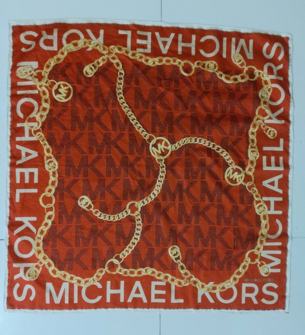 Michael Kors MK Monogram Chain Print handkerchief (Category: Handkerchief & Pocket Squares) located in Lapu Lapu. Submitted by agnesapm_29813 (Listing ID 1464253942, Image 2). Description: - Authentic Michael Kors handkerchief - Vibrant orange color - Signature MK monogram pattern - Elegant gold chain print overlay - Michael Kors logo repeated along the edges - Dimensions: 19.5 x 19.5 inches - Washed and ironed already .