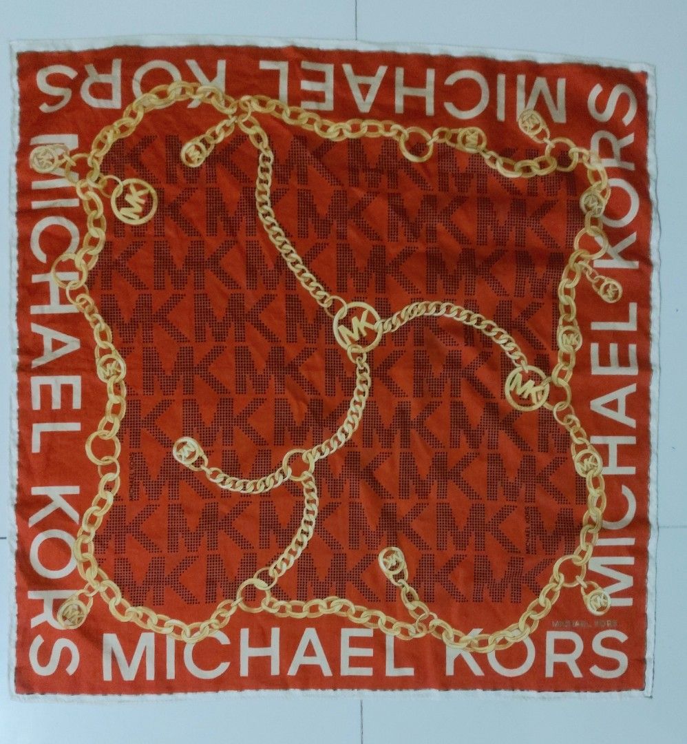 Michael Kors MK Monogram Chain Print handkerchief (Category: Handkerchief & Pocket Squares) located in Lapu Lapu. Submitted by agnesapm_29813 (Listing ID 1464253942, Image 1). Description: - Authentic Michael Kors handkerchief - Vibrant orange color - Signature MK monogram pattern - Elegant gold chain print overlay - Michael Kors logo repeated along the edges - Dimensions: 19.5 x 19.5 inches - Washed and ironed already .
