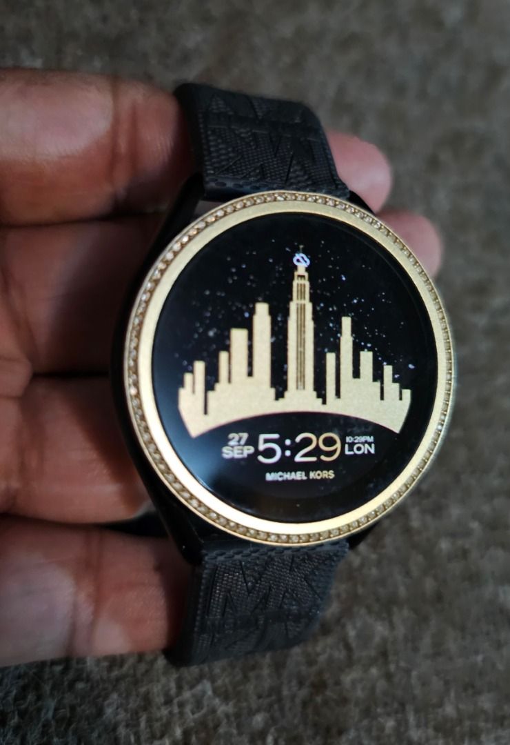 MICHAEL KORS MKGO 5e Smartwatch (Category: Wearables & Smart Watches) located in Caloocan City. Submitted by yatsbatoyskie (Listing ID 1464345069, Image 2). Description: MICHAEL KORS MKGO 5e Smartwatch Google Assistant- Black & Gold, Silicone Strap 43mm aluminum case calls weather heart rate play music and make contactless payments (google pay) google fit download songs to the 4 GB of internal memory, and track your location using the untethered 