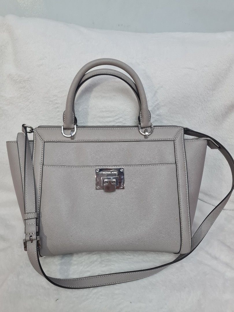 Michael Kors Tina large satchel bag (Category: Luxury Bags & Wallets) located in Quezon City. Submitted by luli_18 (Listing ID 1464258349, Image 1). Description: with removable sling.