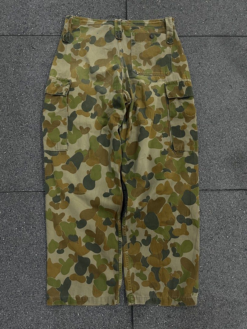 Military Pants (Category: Jeans) located in Pasay City. Submitted by trash_or_treasure.543 (Listing ID 1464302314, Image 1). Description: Vintage Australian Military Camo Cargo Pants featuring their distinctive green brown and tan camou pattern Duck camouflage Measurement: Width: 32 to 34 Length: 40 Inseam: 30 Leg openning: 9.