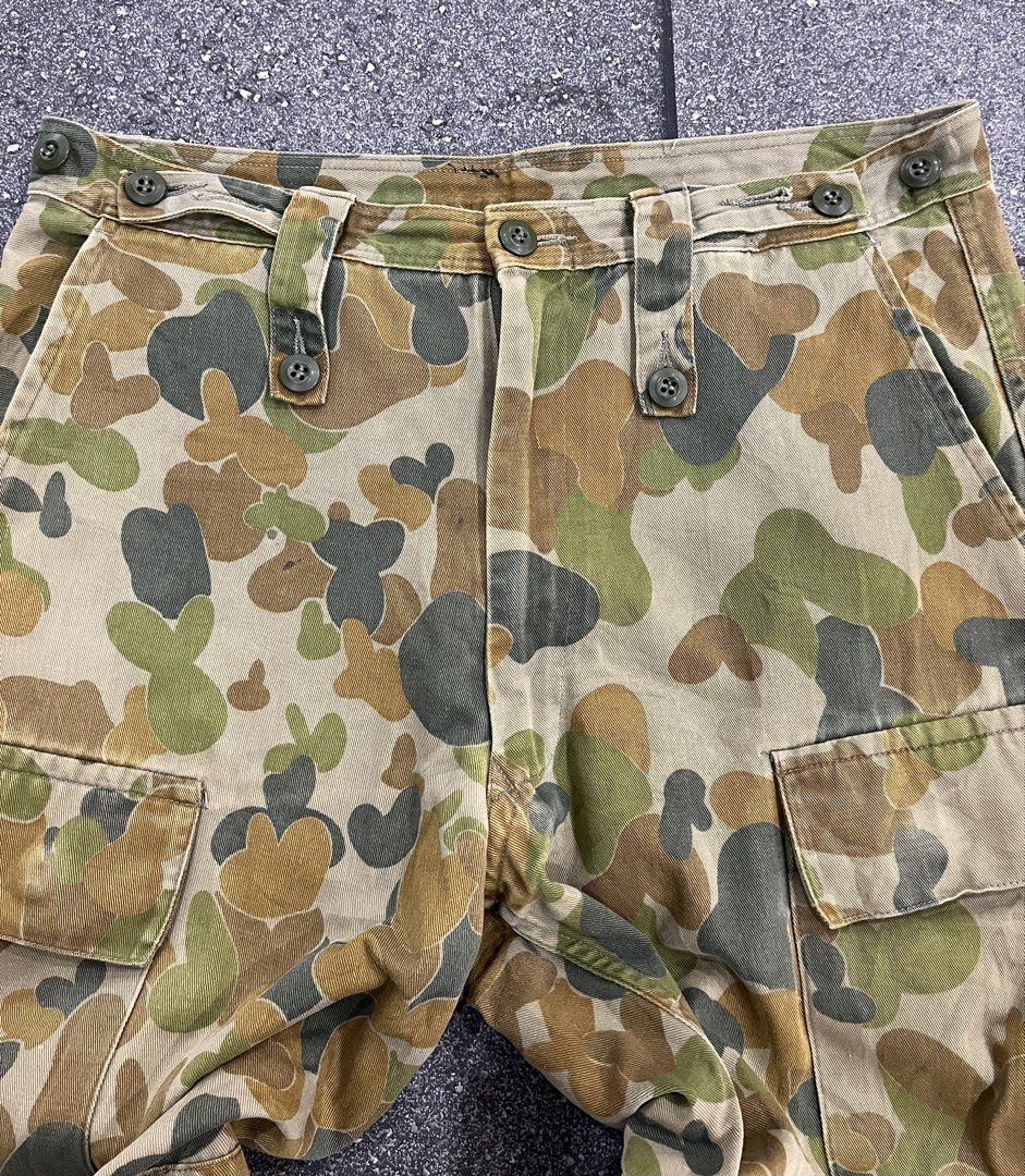 Military Pants (Category: Jeans) located in Pasay City. Submitted by trash_or_treasure.543 (Listing ID 1464302314, Image 3). Description: Vintage Australian Military Camo Cargo Pants featuring their distinctive green brown and tan camou pattern Duck camouflage Measurement: Width: 32 to 34 Length: 40 Inseam: 30 Leg openning: 9.