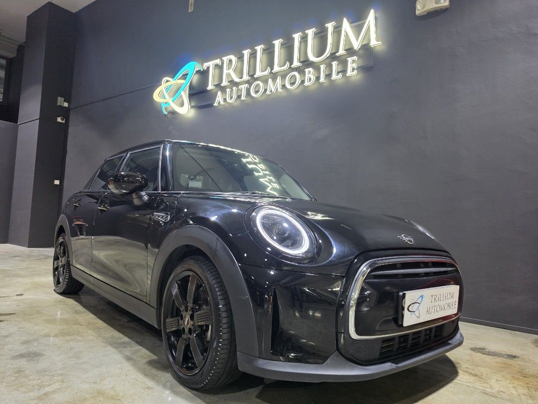 MINI One 5-Door 1.5 5-Door (A) (Category: Used Cars) located in Singapore. Submitted by trillium.auto (Listing ID 1464289438, Image 2). Description: 🚘 Vehicle Features 1.5l TwinPower turbocharged 3 cylinder engine producing 100hp and 190nm of torque, 7 speed (a) DCT. O to 100km/h in 10.2 seconds. 6 airbags. 🚘 Accessories Leather seats, touchscreen LCD screen with Bluetooth, Apple CarPlay/Android Auto, reverse camera & navigation system, dashcam