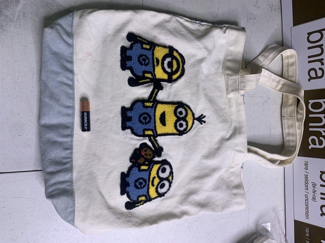 Minions Tote Bag - Canvass Bag (Category: Character Goods) located in Carmona. Submitted by bihira (Listing ID 1464280471, Image 1). Description: Minions Tote Bag - Canvass Bag - WYSIWYG - Authentic Minion Merch - Canvass Material - Embosed Minions.