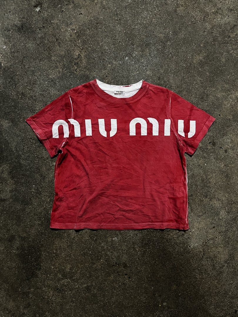 Miu Miu - Screenprint Block Logo Shirt (Category: Shirts) located in Manila. Submitted by kashjulliane (Listing ID 1464303309, Image 1). Description: Good condition 9/10 Color rate Made in Italy Deadstock Size: Medium Width: 21 Length: 20.
