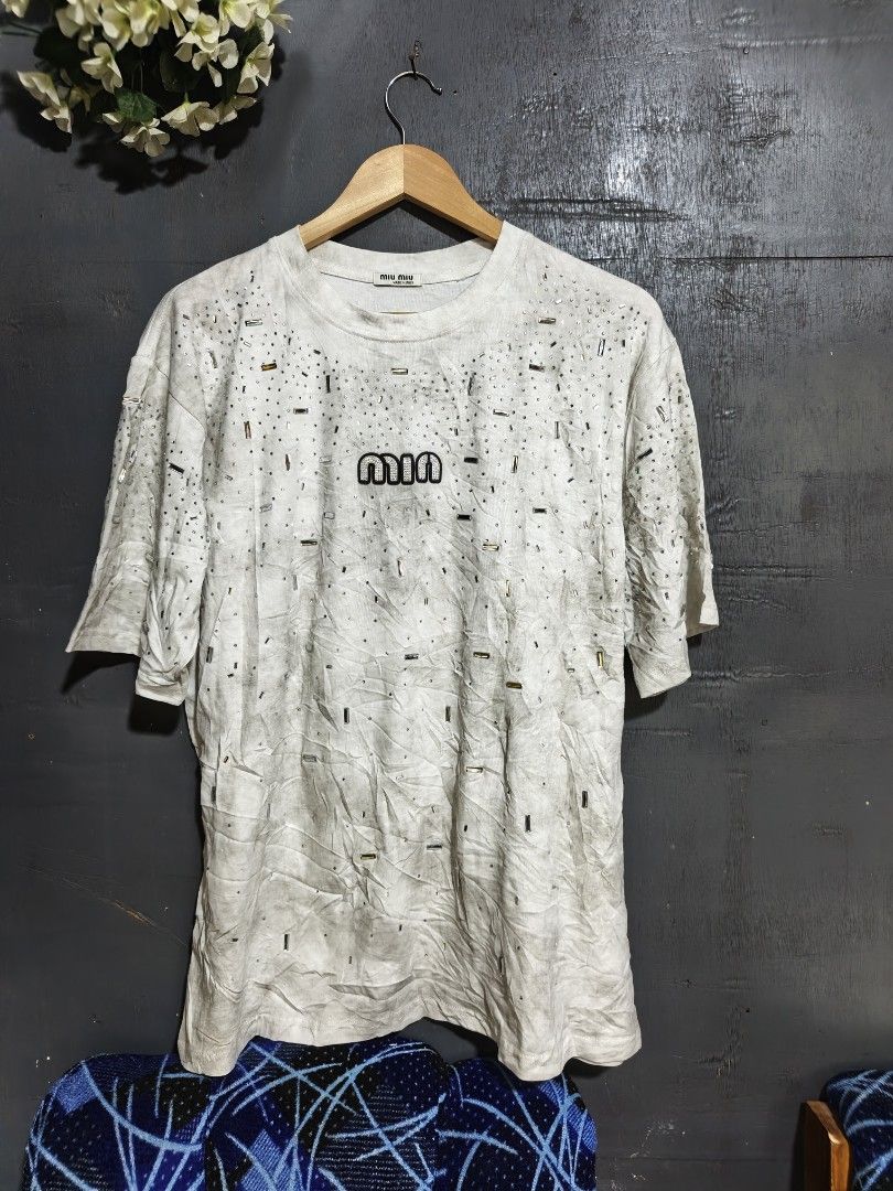 Miumiu Shirt (Category: Luxury Apparel) located in Tacurong. Submitted by lyjetbrandedfinds_1827 (Listing ID 1464163604, Image 1). Description: L-XL AS NEW.