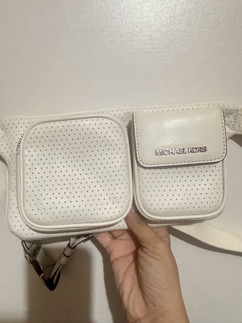 Mk belt bag (Category: Cross-body Bags) located in Tandag. Submitted by kawaiispreloved (Listing ID 1464212778, Image 1). Description: Original Michael Kors beltbag With signs of usage ( actually nakatambak lang) .