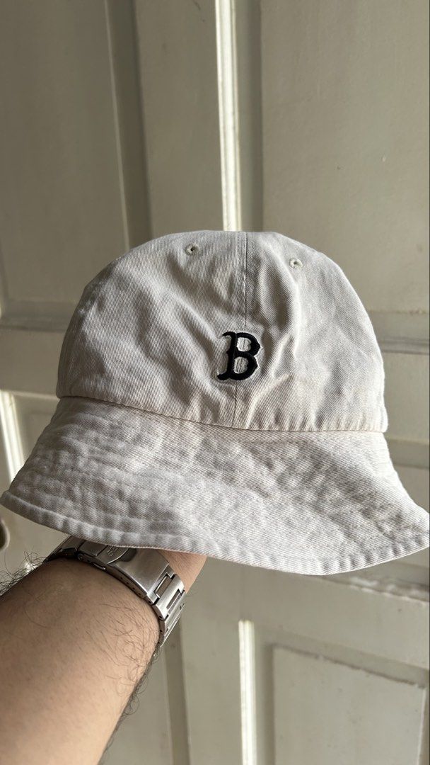 MLB Major League Baseball Bucket Hat (Category: Caps & Hats) located in General Santos City (Dadiangas). Submitted by moana_thrifts (Listing ID 1464171460, Image 2). Description: - White bucket hat with 'B' embroidery on the front. - Adorable bear graphic with a heart balloon on the side. - Includes MLB logo patch. - Made from comfortable cotton material. - Ideal for sunny weather and casual wear..