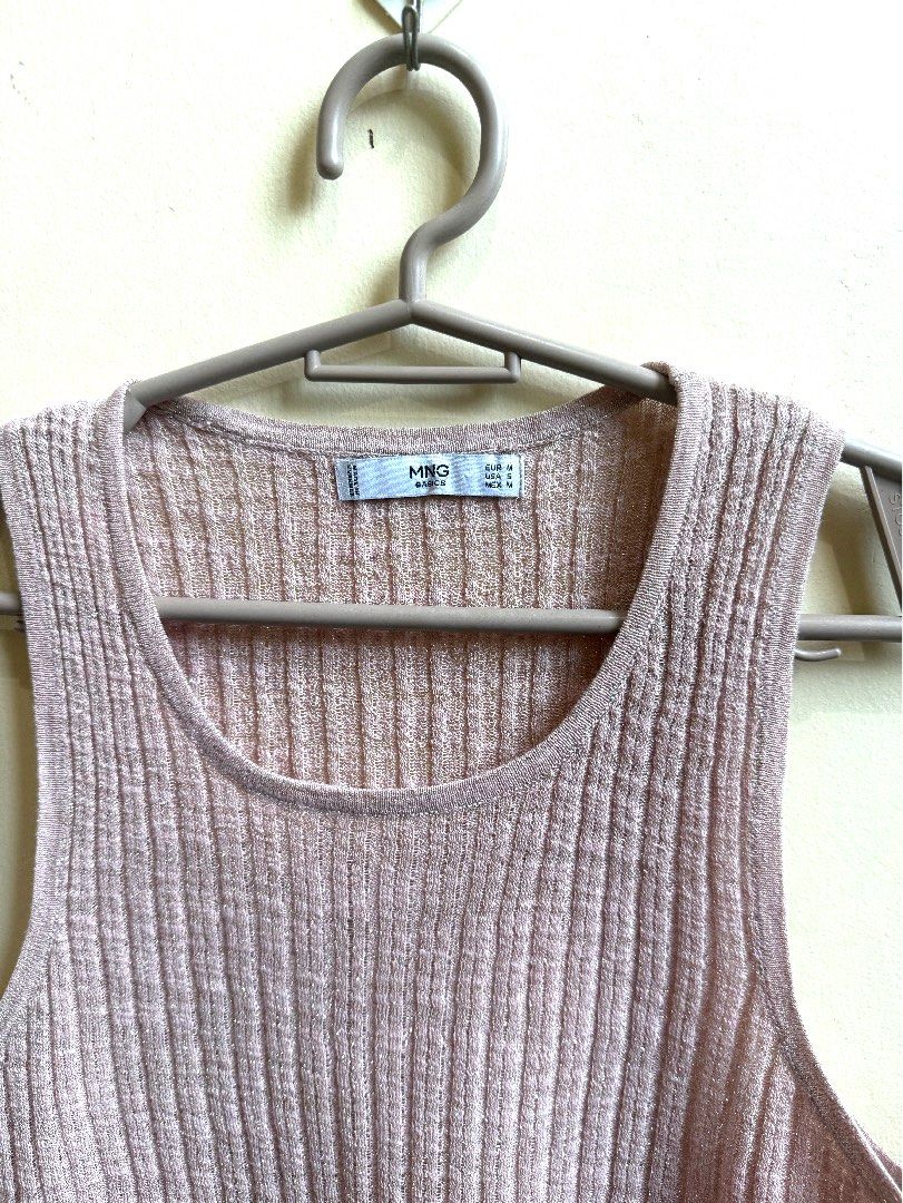 MNG Basics Ribbed Knit Tank Top - Pink (Category: Sleeveless) located in Pasig City. Submitted by amadamnl (Listing ID 1464159172, Image 2). Description: - Pink ribbed knit tank top - color is a very pale pink - Brand: MNG Basics - Sleeveless design - Scoop neckline - Subtle shimmer in fabric -.