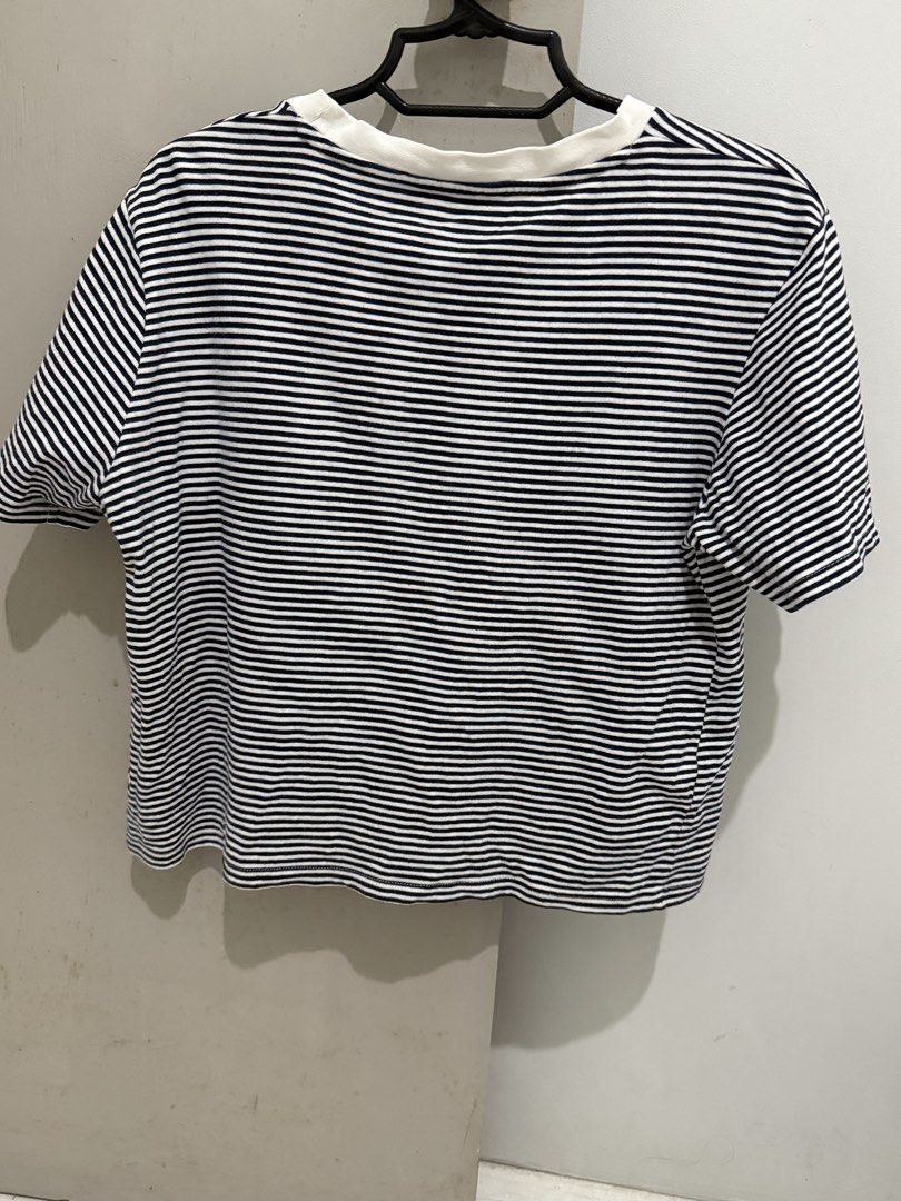 MNG Striped T-shirt Size M (Category: Shirts) located in Mandaluyong City. Submitted by trovebya (Listing ID 1464239906, Image 2). Description: - Classic navy and white stripes - Brand: MNG - Short sleeves - Crew neck - Versatile for casual wear - Easy to pair with jeans or shorts.