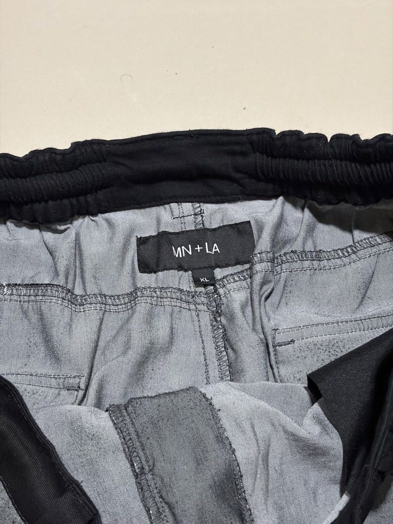 MN+LA DOJO Pants Stone Grey XL (Category: Jeans) located in Bacolod City. Submitted by simulasawala (Listing ID 1464255912, Image 2). Description: - Grey wide leg cropped pants - Brand: MN+LA - Elastic waistband with drawstring - Two back pockets with embroidered 'M' detail - Relaxed fit, very comfortable - Size: XL.