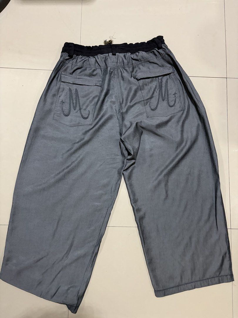 MN+LA DOJO Pants Stone Grey XL (Category: Jeans) located in Bacolod City. Submitted by simulasawala (Listing ID 1464255912, Image 3). Description: - Grey wide leg cropped pants - Brand: MN+LA - Elastic waistband with drawstring - Two back pockets with embroidered 'M' detail - Relaxed fit, very comfortable - Size: XL.