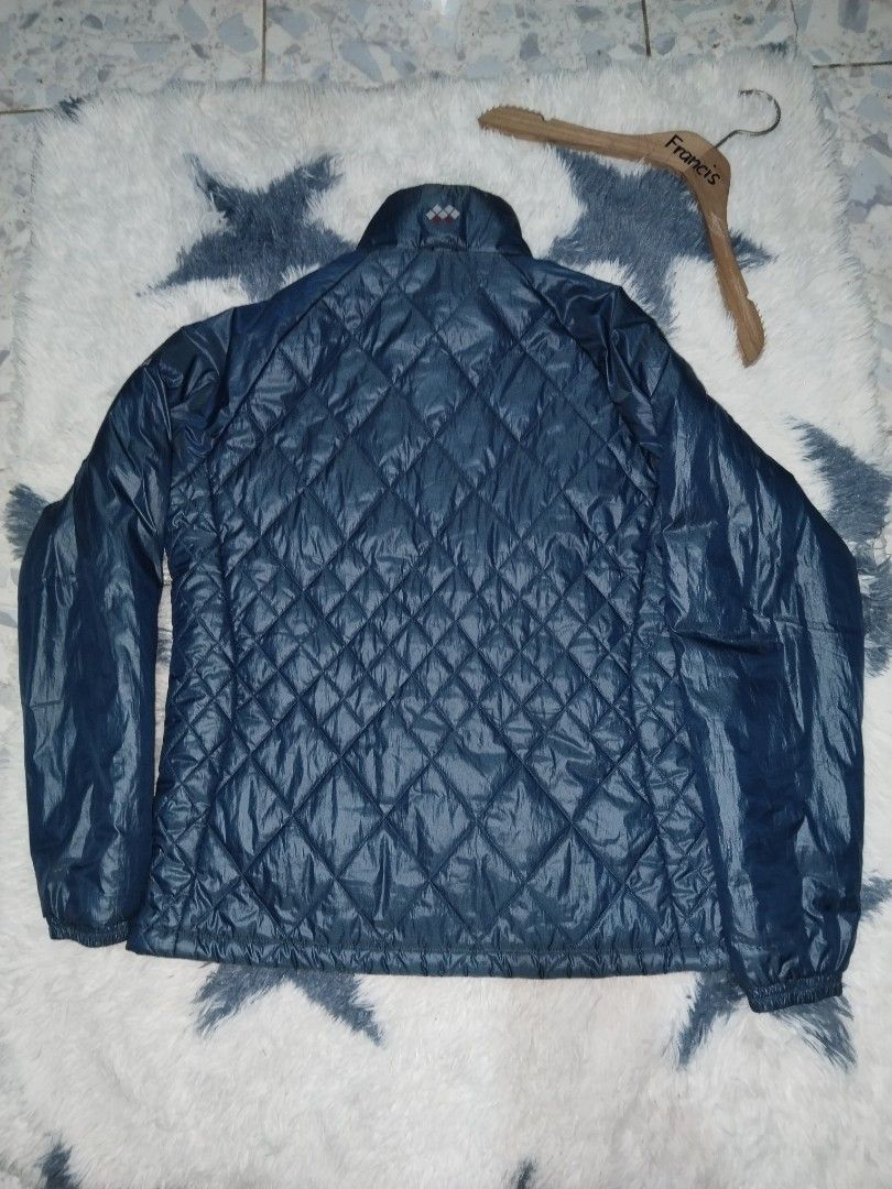Montbell puffer jacket (Category: Coats, Jackets and Outerwear) located in Barili. Submitted by francis88z (Listing ID 1464279013, Image 2). Description: montbell puffer jacket size L W21L25 as new condition no issue 1500+sf.