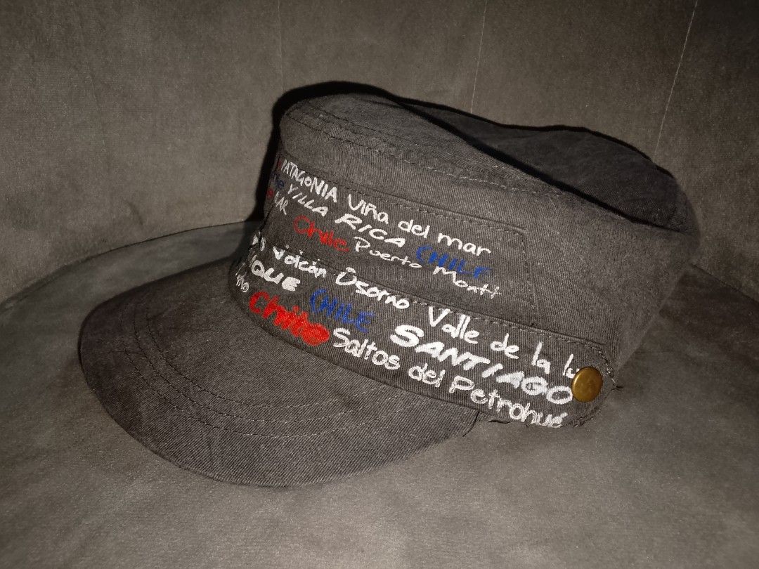 Morpho Chile Souvenir Cadet Hat (Category: Hats & Beanies) located in Binangonan. Submitted by yuristalin888 (Listing ID 1464312767, Image 2). Description: This unique charcoal grey cadet-style hat is an excellent souvenir from Chile. It features an embroidered band with a list of notable Chilean locations, including Patagonia, Viña del Mar, Villarrica, Puerto Montt, Salar, Valparaíso, Chiloé, San Pedro de Atacama, Andes, Iquique, Pucón, and Geys