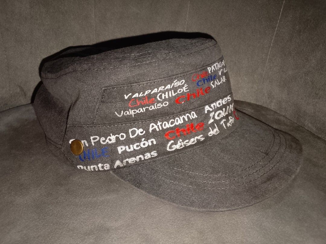 Morpho Chile Souvenir Cadet Hat (Category: Hats & Beanies) located in Binangonan. Submitted by yuristalin888 (Listing ID 1464312767, Image 3). Description: This unique charcoal grey cadet-style hat is an excellent souvenir from Chile. It features an embroidered band with a list of notable Chilean locations, including Patagonia, Viña del Mar, Villarrica, Puerto Montt, Salar, Valparaíso, Chiloé, San Pedro de Atacama, Andes, Iquique, Pucón, and Geys