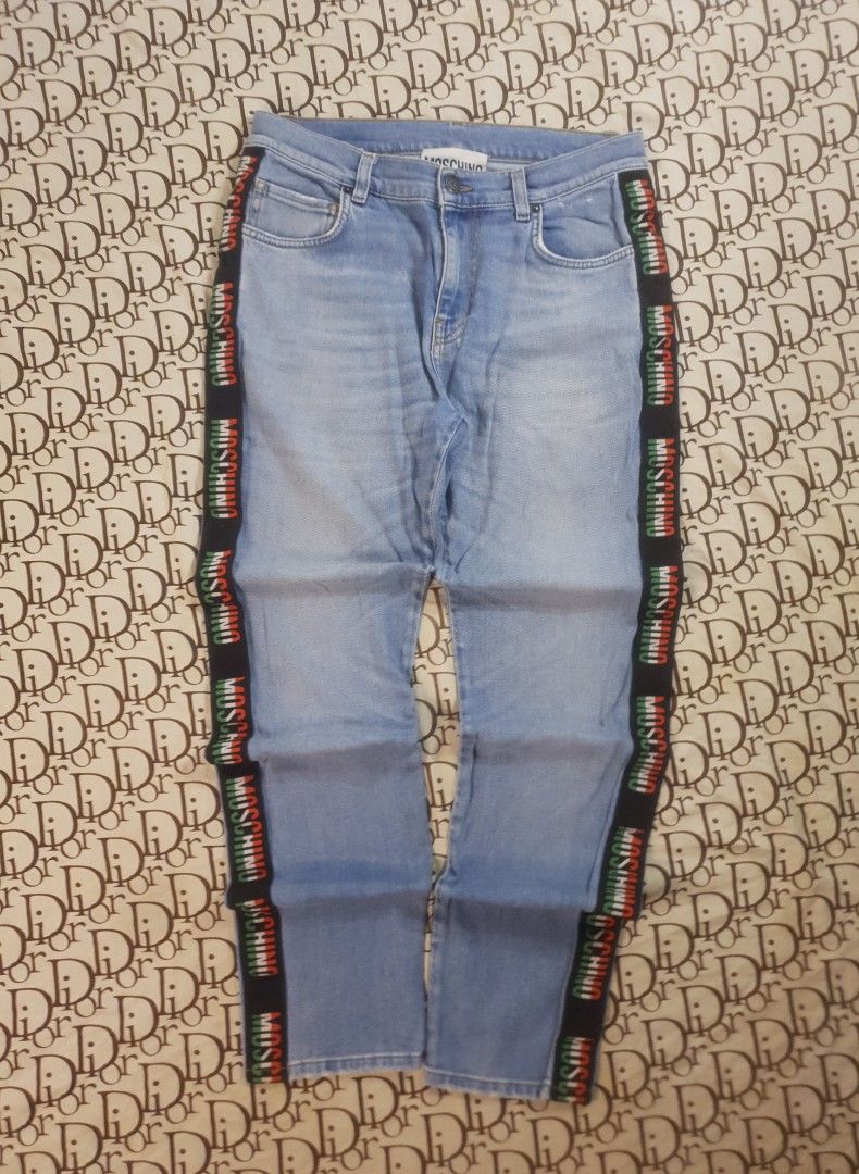 Moschino Jean's sidetape design (Category: Jeans) located in San Fernando. Submitted by retro.district. (Listing ID 1464303302, Image 1). Description: - Authentic Moschino Pants side tape - Size: Waistline: 32 Length: 41 thighs: 10 Leg Opening: 7 - Condition: Excellent - No issue.