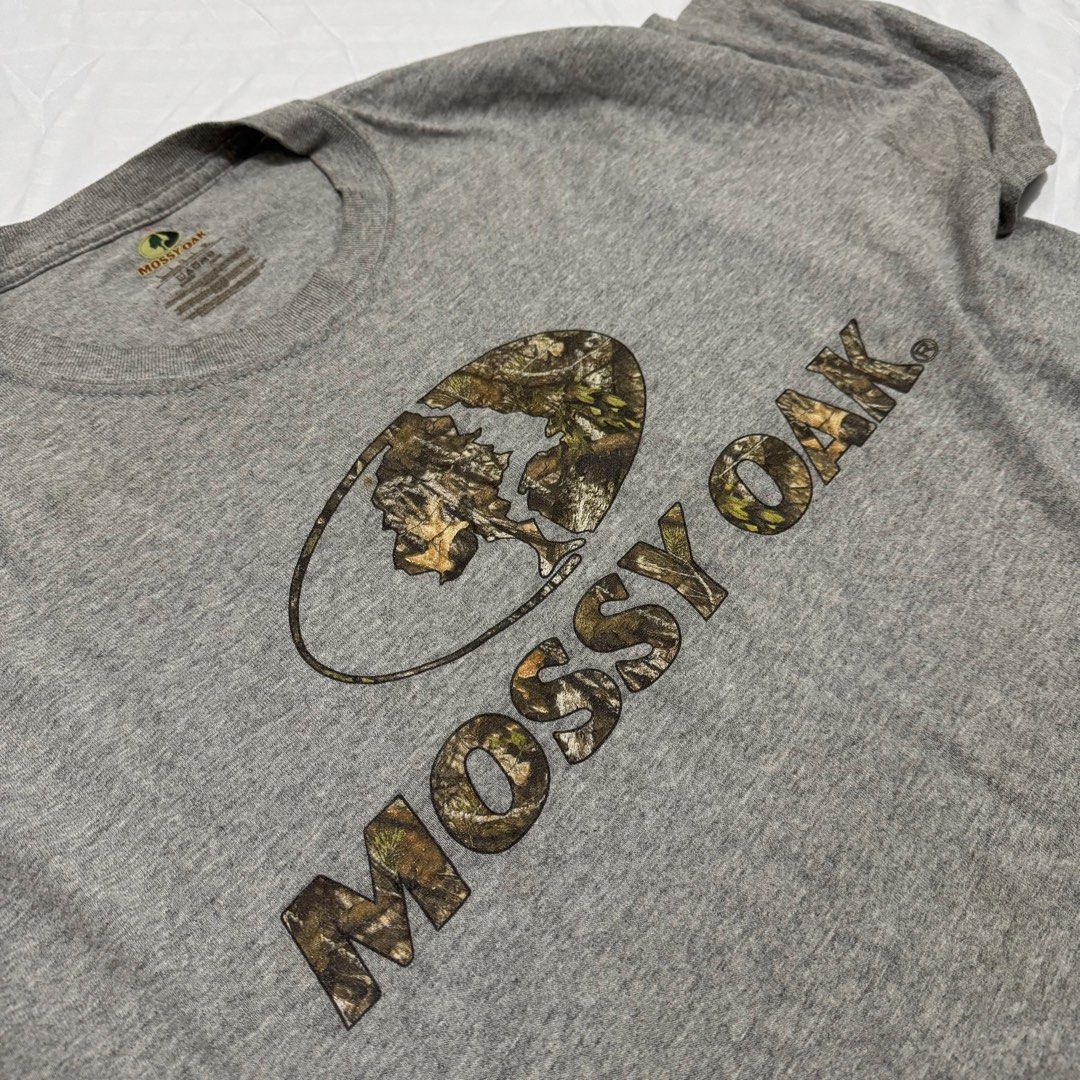 MOSSY OAK (Category: Tshirts & Polo Shirts ) located in Pasig City. Submitted by jaaard (Listing ID 1464247465, Image 2). Description: Mossy oak Size L 23x29.5 Good condition need wash 1 repaired pinhole issue rightside front part pm me for more details.