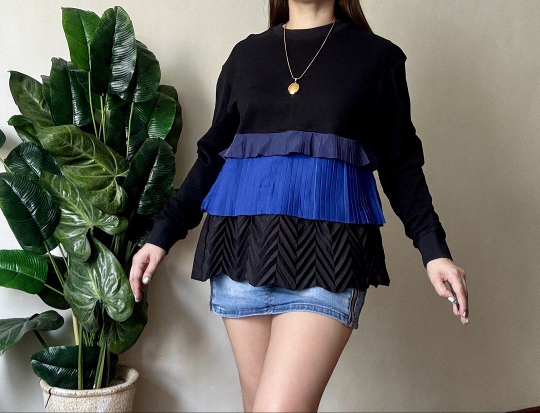 MSGM Black Blue Pleated Layered Sweatshirt,m to l (Category: Longsleeves) located in Mandaluyong City. Submitted by roxieeeeeee (Listing ID 1464320715, Image 3). Description: - Black long-sleeved sweatshirt - Features layered pleated details - Navy blue and royal blue ruffles and pleats - Unique design with mixed textures - Perfect for a statement look - Pairs well with jeans or skirts ✅ Like new condition ✅ Ships 1 day after payment ✅ Please all