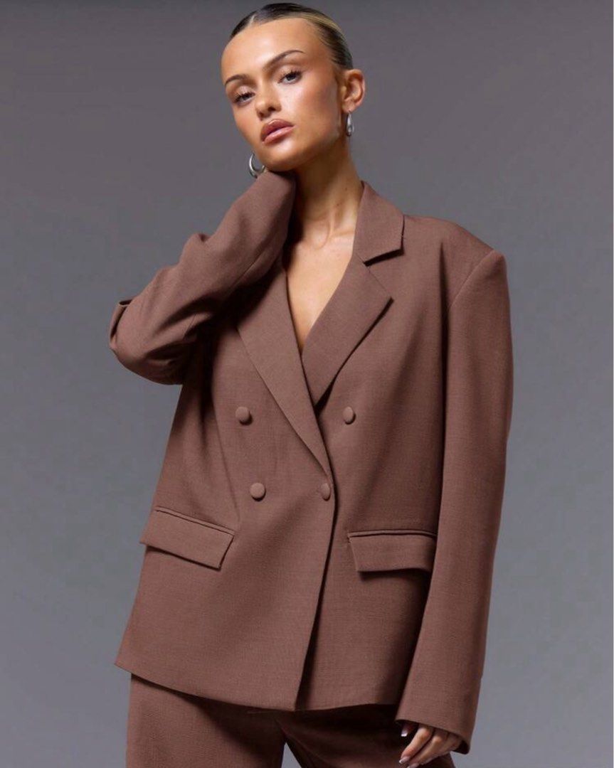 Musera Double-breasted Brown blazer (Category: Coats, Jackets and Outerwear) located in Cavite. Submitted by _ysa_belle (Listing ID 1464272947, Image 1). Description: - Mauve double-breasted blazer - Two front buttons - Two side flap pockets - Fully lined interior - Perfect for dressing up or down - Pairs well with jeans or trousers - Blazer only.