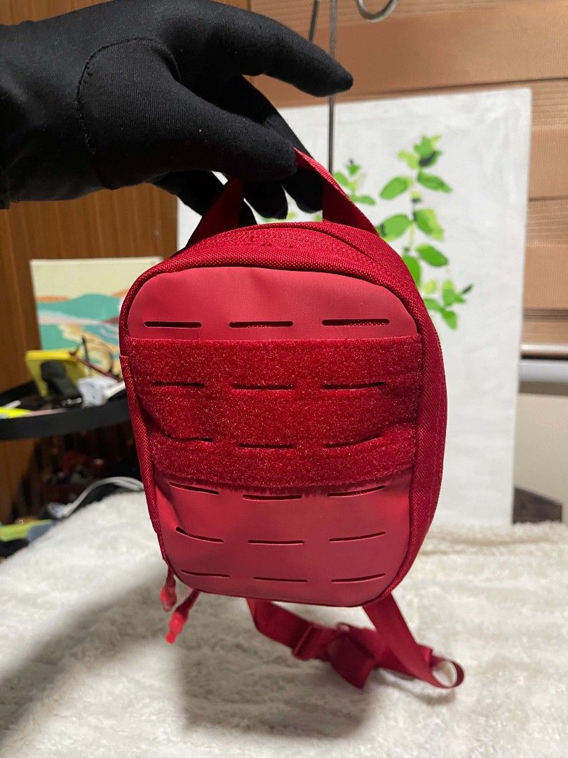MY MEDIC Red belt Bag (Category: Cross-body Bags) located in Naawan. Submitted by twilly.apparel2 (Listing ID 1464241185, Image 2). Description: - Red pouch bag from MY MEDIC - MOLLE compatible webbing on front - Zipper closure - Adjustable strap included - Small and compact size - Ideal for organizing small essentials.