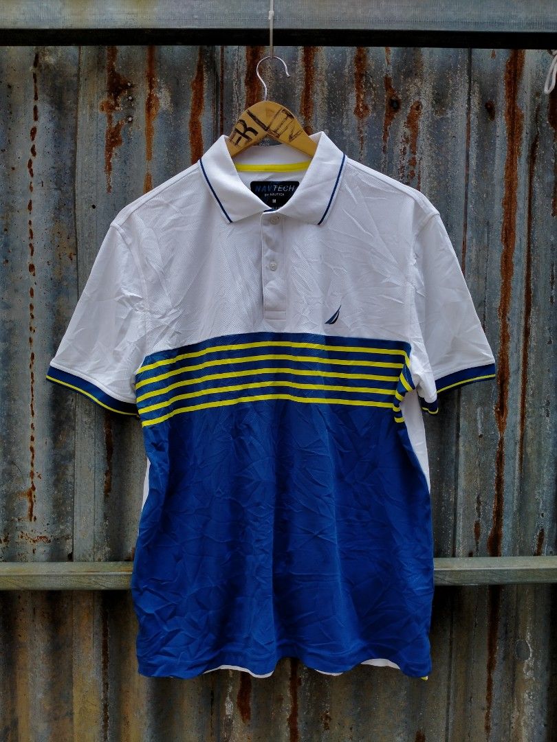 Nautica Navtech Polo Shirt Size M (Category: Tshirts & Polo Shirts ) located in Davao. Submitted by ervinpolino09 (Listing ID 1464180194, Image 1). Description: - Nautica Navtech Polo Shirt - Color: White with blue and yellow chest stripes - Material: 100% Recycled Polyester - Feature: Sustainably crafted - Size: Medium (M)-Large Dimension width 22 length 27.5 As new condition - Perfect for: Casual outings or sports activities.