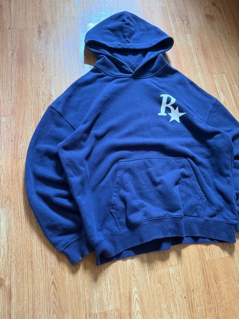 Navy Blue Boxy Hoodie (Category: Coats, Jackets and Outerwear) located in Angeles City. Submitted by repurposedwear (Listing ID 1464170631, Image 3). Description: Navy blue hoodie with white 'R*' logo on front and back. Features a front pocket and hood. Perfect for casual, everyday wear. Must have, heavy fabric🫵 Design and fitting goes hardd🔥 No issues/Ready to wear Dimes : W : 26 L : 28.5.