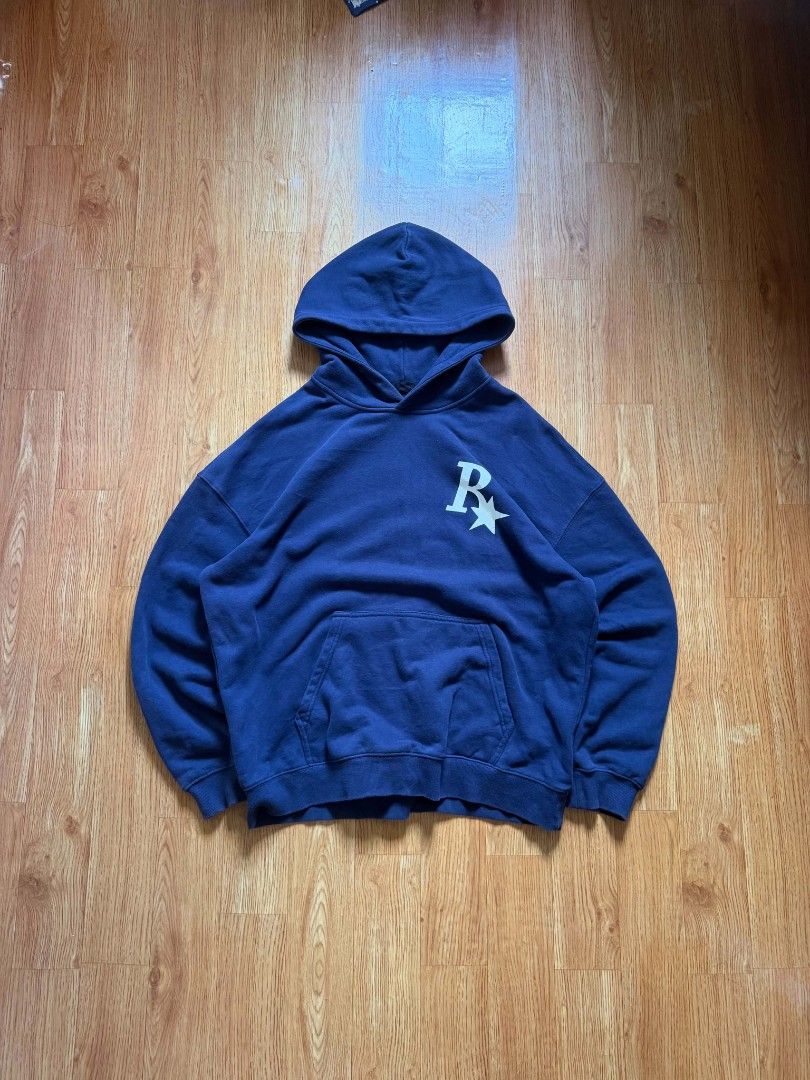 Navy Blue Boxy Hoodie (Category: Coats, Jackets and Outerwear) located in Angeles City. Submitted by repurposedwear (Listing ID 1464170631, Image 1). Description: Navy blue hoodie with white 'R*' logo on front and back. Features a front pocket and hood. Perfect for casual, everyday wear. Must have, heavy fabric🫵 Design and fitting goes hardd🔥 No issues/Ready to wear Dimes : W : 26 L : 28.5.