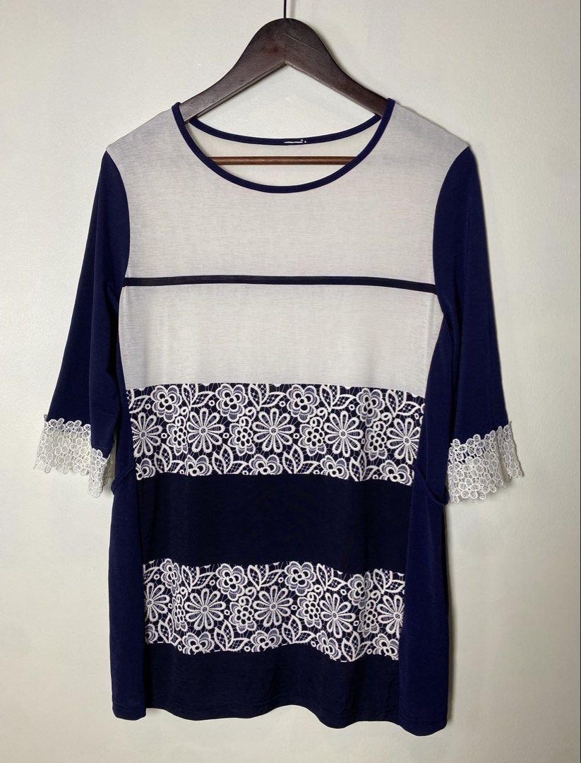 Navy blue lace blouse (Category: Blouses) located in Makati City. Submitted by indaysukaycloset (Listing ID 1464195903, Image 1). Description: 🤍 NAVY BLUE LACE BLOUSE - Size M~L (Fits Medium to Large) Color: Navy Blue / Off-white / White lace Size on tag: M~L - fits M to L Fabric: Polyester 95% / Polyurethane 5% - soft, stretchy, comfy Details: - Round neck, 3/4 sleeves - 2 floral lace panels in front - Real crochet lace cuffs (super pretty in a