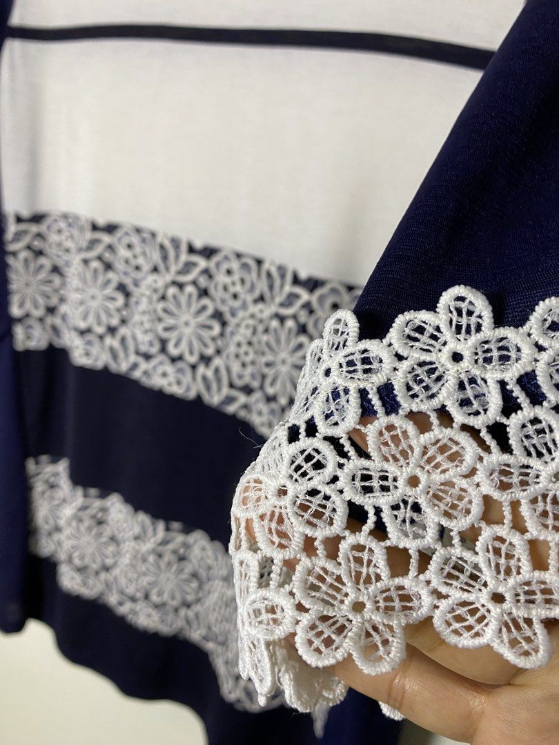 Navy blue lace blouse (Category: Blouses) located in Makati City. Submitted by indaysukaycloset (Listing ID 1464195903, Image 3). Description: 🤍 NAVY BLUE LACE BLOUSE - Size M~L (Fits Medium to Large) Color: Navy Blue / Off-white / White lace Size on tag: M~L - fits M to L Fabric: Polyester 95% / Polyurethane 5% - soft, stretchy, comfy Details: - Round neck, 3/4 sleeves - 2 floral lace panels in front - Real crochet lace cuffs (super pretty in a