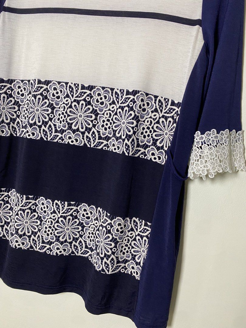 Navy blue lace blouse (Category: Blouses) located in Makati City. Submitted by indaysukaycloset (Listing ID 1464195903, Image 2). Description: 🤍 NAVY BLUE LACE BLOUSE - Size M~L (Fits Medium to Large) Color: Navy Blue / Off-white / White lace Size on tag: M~L - fits M to L Fabric: Polyester 95% / Polyurethane 5% - soft, stretchy, comfy Details: - Round neck, 3/4 sleeves - 2 floral lace panels in front - Real crochet lace cuffs (super pretty in a