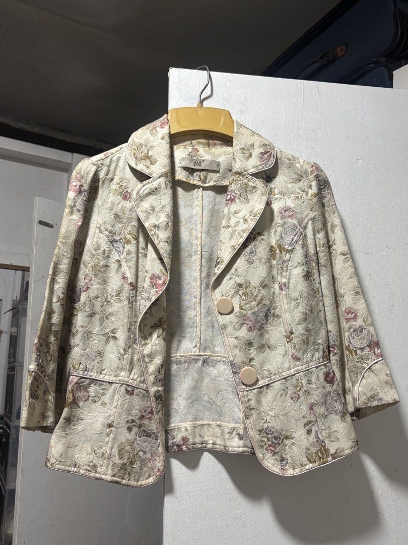 NC Floral Print Blazer Jacket (Category: Coats, Jackets and Outerwear) located in Quezon City. Submitted by ricalazo (Listing ID 1464187997, Image 1). Description: - Cream-colored blazer - Beautiful floral print - Lapel collar - Two button closures - Three-quarter length sleeves - Versatile: pairs well with jeans or trousers - A lovely addition to any wardrobe.