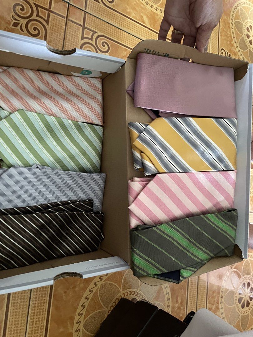 Neck Tie (Category: Coats, Jackets and Outerwear) located in Manila. Submitted by peansandtobs (Listing ID 1464160901, Image 2). Description: 250 each Brands are Ponti, Barrington etc. depends on the tie Sf must be shouldered by the buyer.