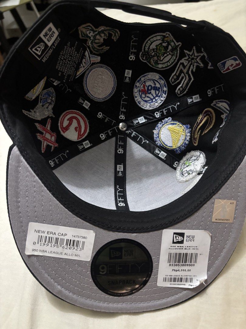 New Era Cap 950 NBA League Allover Snapback Hat (Medium/Large) (Category: Caps & Hats) located in Taguig. Submitted by dekatrio (Listing ID 1464164830, Image 3). Description: - Original Price: Pho 4,595 - Brand New Black New Era 9FIFTY Snapback Hat - Features multiple NBA team logos all over - Size: Medium/Large - Comes with original tags - Ideal for any basketball fan.