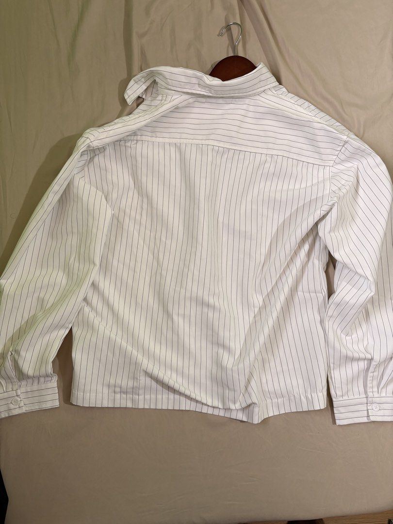 New Polo | Never Worn (Category: Formal Shirts) located in Manila. Submitted by itsjohnpaul (Listing ID 1464146760, Image 2). Description: Bought from the Made in MNL Official Store. Never worn. I originally planned to wear this for my internship, but the sleeves turned out to be too big/long for my arms. Condition: Brand new / never worn Reason for selling: Sleeves are too big for me..