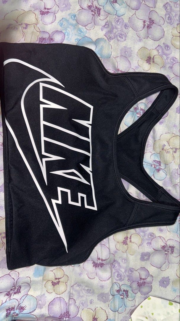Nike & Under Armour Sports Bras Bundle (Category: Activewear) located in Mandaluyong City. Submitted by trishure19 (Listing ID 1464278087, Image 2). Description: -bundle 3 sports bras -band size 12 inches -RFS too tight for me -all padded .