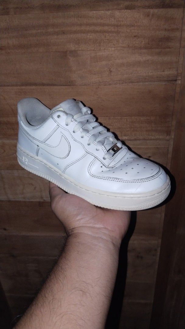 Nike Air Force 1 '07 Essential Womens Shoe (Category: Sneakers) located in Manila. Submitted by bigbenplaysthriftstore (Listing ID 1464293513, Image 3). Description: - Classic white Nike Air Force 1s - Iconic AF1 detailing on lace locks - Pre-loved with plenty of life left - Ideal for casual wear - A must-have for any sneaker collection.