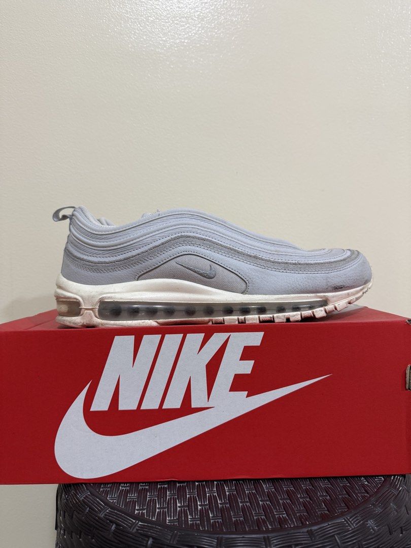 Nike Air Max 97 SE Pure Platinum Wolf Grey (Category: Sneakers) located in Manila. Submitted by karlllllllllllll (Listing ID 1464173884, Image 1). Description: - Nike Air Max 97 SE - Colorway: Pure Platinum/Wolf Grey - Size: UK 9 / US 10 / EUR 44 - Used thrice only - Includes original box.