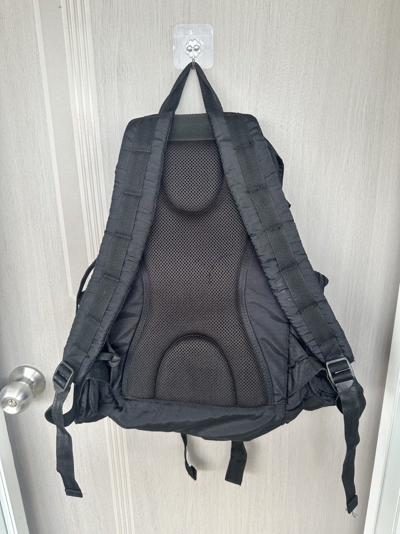 Nike Black Nylon Backpack (Category: Backpacks) located in Digos. Submitted by reywearfinds (Listing ID 1464161727, Image 2). Description: - Black Nike backpack - Made from durable nylon material - Multiple pockets for organization - Adjustable straps with padding for comfort - Ideal for everyday use or travel - Please check photos for detailed condition.