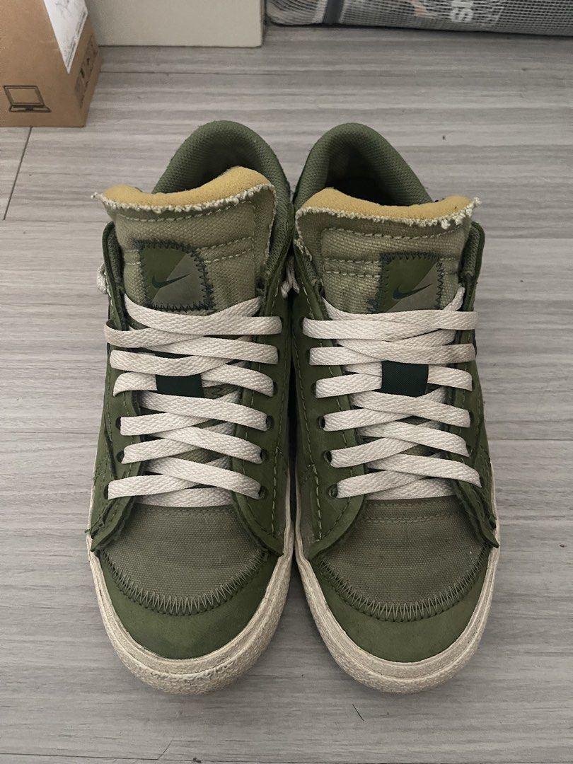 Nike Blazer Low Olive Green Suede Canvas (Category: Sneakers) located in Pasig City. Submitted by beachboy01 (Listing ID 1464289585, Image 2). Description: AUTHENTIC NO SOLE SEPARATION NO BOX - Olive green Nike Blazer Lows - Suede and canvas upper - White laces and sole - Classic Nike branding on the heel - Ideal for casual wear.