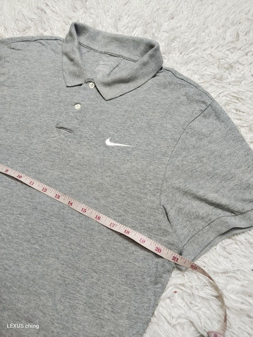NIKE classic grey a two button placket and a small embroidered logo swoosh. (Category: Tshirts & Polo Shirts ) located in Manila. Submitted by lexusthrift1995 (Listing ID 1464225422, Image 2). Description: Size- XL on tag but fit to LARGE Dimension- 21x27 Color rate- 9/10 Condition-9/10 issue- stitch sa collar and faded print tag see last pics good condition ‼️300.pesos plus shipping fee 💸MODE OF PAYMENT- GCASH payment first 🚛MODE OF DELIVERY- 