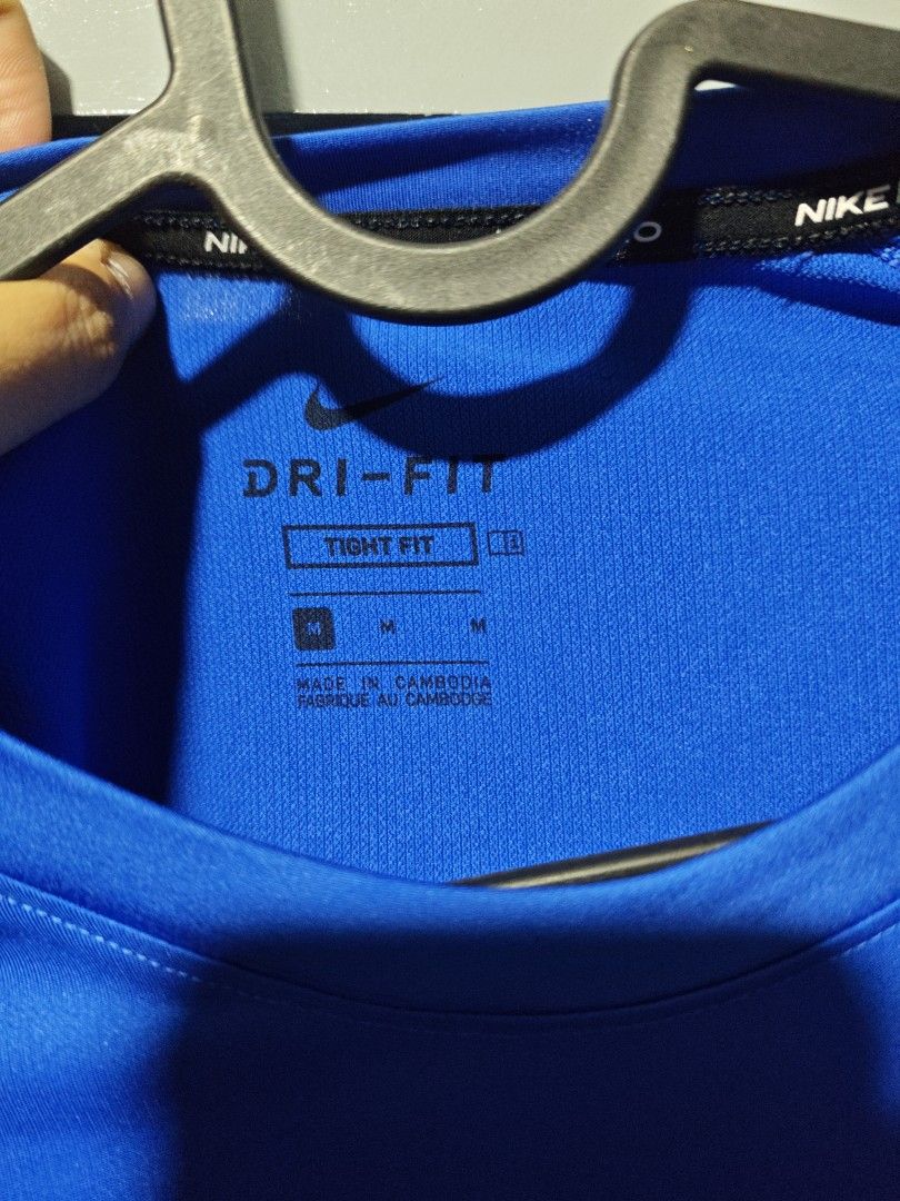 NIKE COMPRESSION LONG SLEEVES (M) (Category: Activewear) located in Las Pinas. Submitted by mojoejoejoe2 (Listing ID 1464168976, Image 2). Description: - Blue Nike Dri-Fit T-shirt - Tight fit design - Made in Cambodia - Ideal for workouts or everyday wear - Comfortable and breathable fabric.