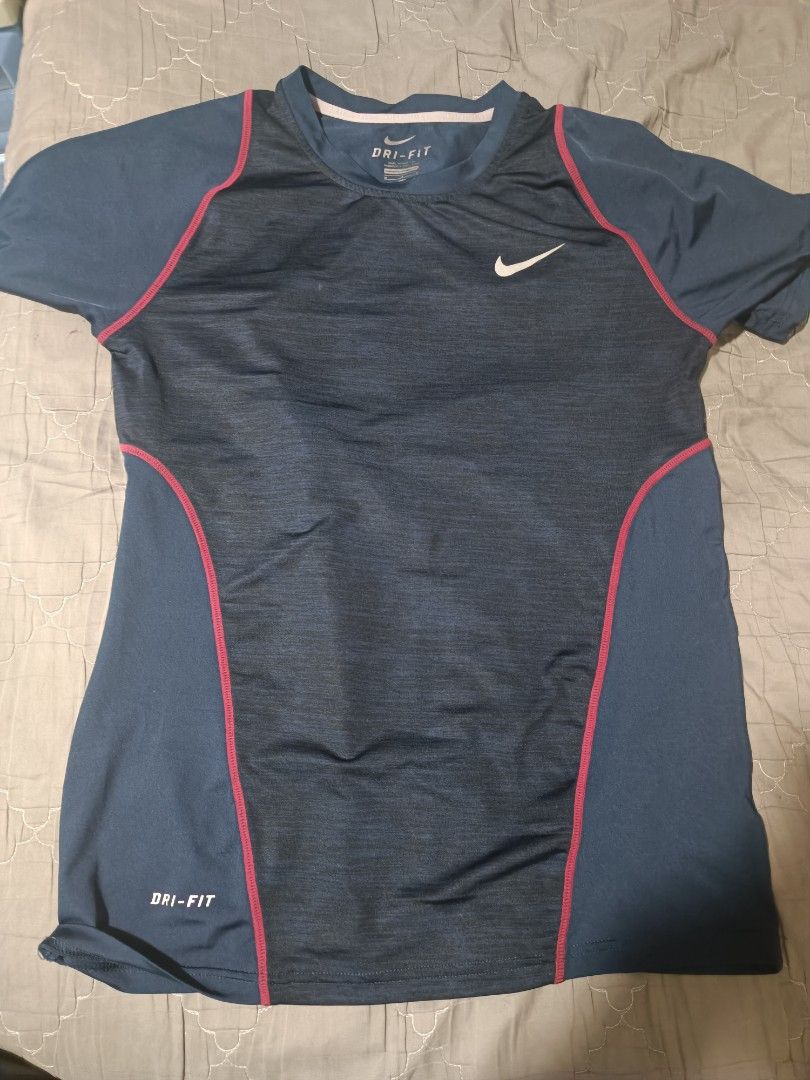 Nike DriFit Shirts bundle (Category: Activewear) located in Manila. Submitted by lapulga900 (Listing ID 1464229034, Image 1). Description: Both size M, but the gray one can fit size L better. negotiable.