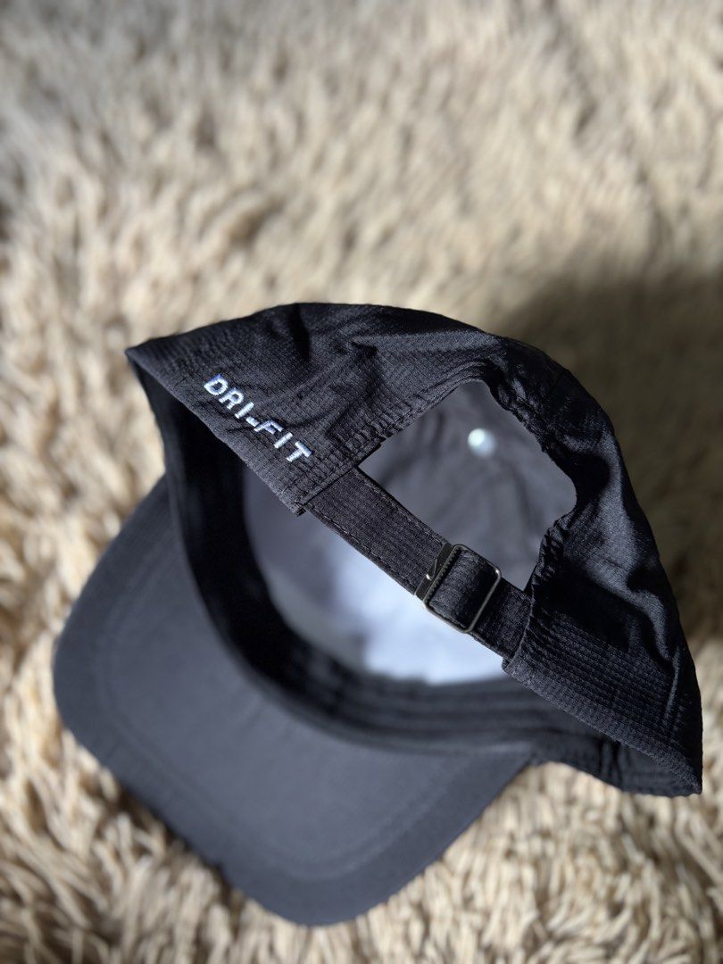 Nike Dri-Fit Tennis Cap Black (Category: Caps & Hats) located in Quezon City. Submitted by nojthrift (Listing ID 1464250751, Image 3). Description: - Black Nike Dri-Fit Cap - Features classic NikeCourt logo - Adjustable strap for a custom fit - Made with breathable Dri-Fit material - Ideal for sports and everyday casual wear 650+ship only.