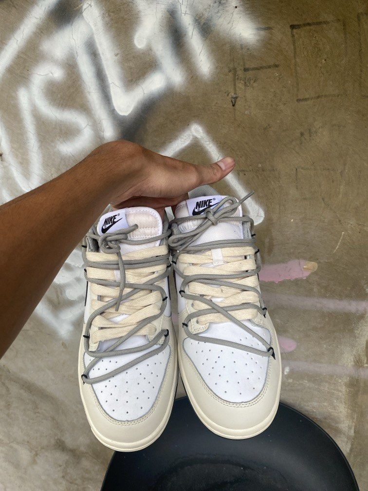 Nike Dunk Low "Feliz San Valentin" (Category: Sneakers) located in Manila. Submitted by w1seman (Listing ID 1464164990, Image 2). Description: - Nike Dunk Low "Feliz San Valentin" sneakers - Stylish cream and brown colorway - Features unique "Feliz San Valentin" text on the side - Comes with extra laces for customization - Ideal for sneaker collectors or everyday wear.