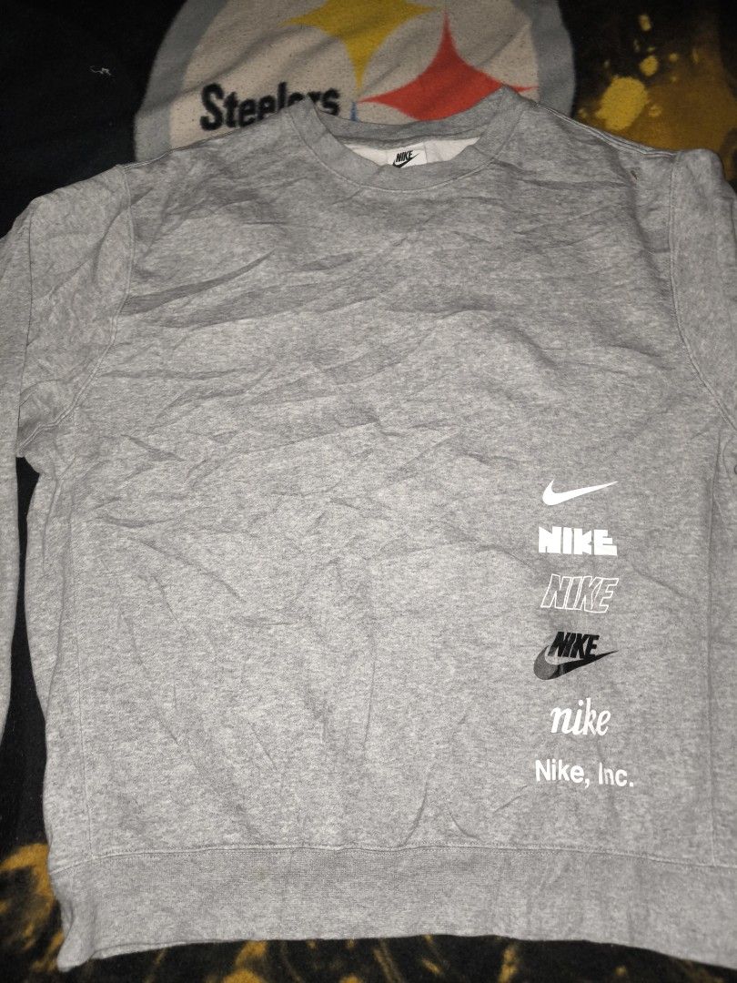 Nike Grey Crewneck Multi logo (Category: Coats, Jackets and Outerwear) located in Manila. Submitted by fljaoti27 (Listing ID 1464252759, Image 2). Description: Nike crewneck Large.