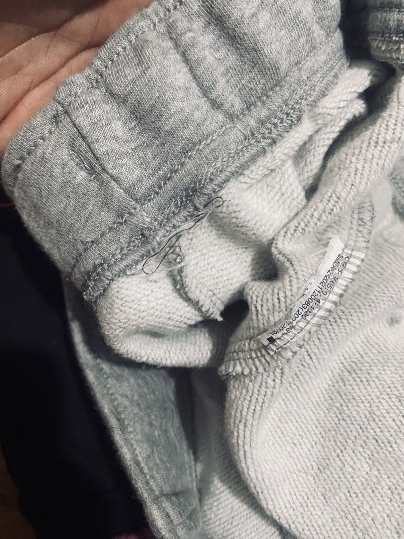 Nike Grey Jogger Sweatpants (Category: Joggers) located in Las Pinas. Submitted by johnpaul2525 (Listing ID 1464299405, Image 3). Description: - Grey Nike sweatpants - Elastic waistband with adjustable drawstring - Cuffed ankles for a snug fit - Small, iconic Nike logo on the left leg - Versatile: Ideal for lounging, workouts, or casual wear - Easy to style with any t-shirt or hoodie.