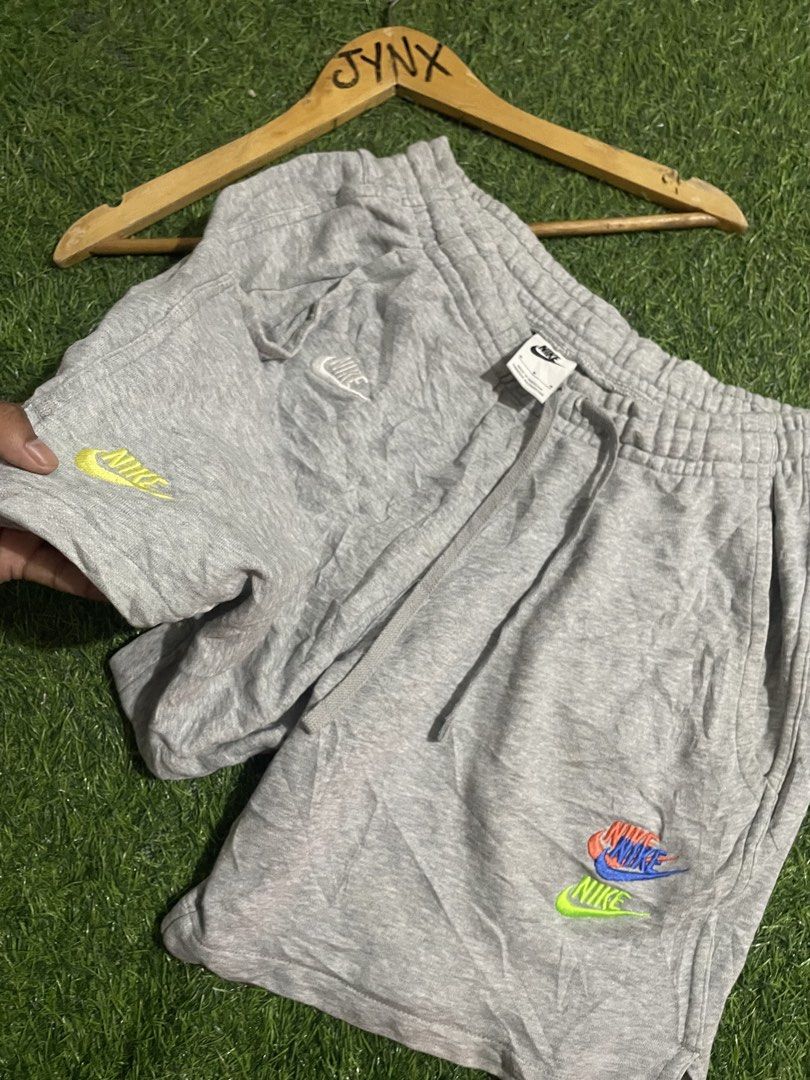 Nike Grey Sweat Shorts Multi-Logo Size M (Category: Shorts) located in Las Pinas. Submitted by jynxdefant26140 (Listing ID 1464306747, Image 3). Description: - Grey Nike sweat shorts - Multiple embroidered Nike logos in different colors on front - Elastic waistband with drawstring - Made in Pakistan - Size M.