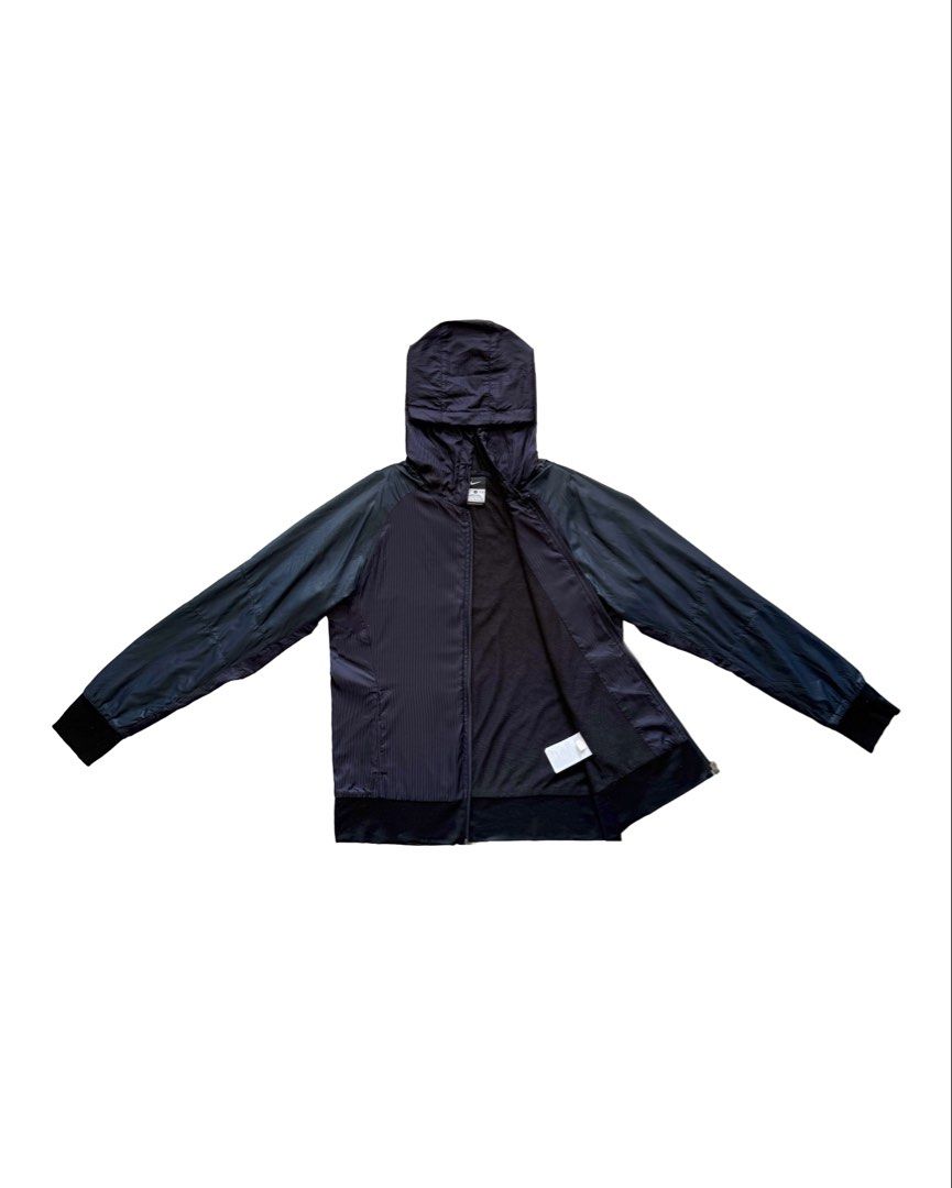 Nike Hooded Jacket (Category: Coats, Jackets and Outerwear) located in Manila. Submitted by morf_sply (Listing ID 1464301488, Image 2). Description: Regular fit jacket with an adjustable hood, long sleeves with ribbed cuffs, welt pockets at the hip and ribbed hem. Zip-up front. Broken puller. M on tag. Shoulder Width 18 in Pit to Pit19 in Length 25 in Sleeves 23 in.